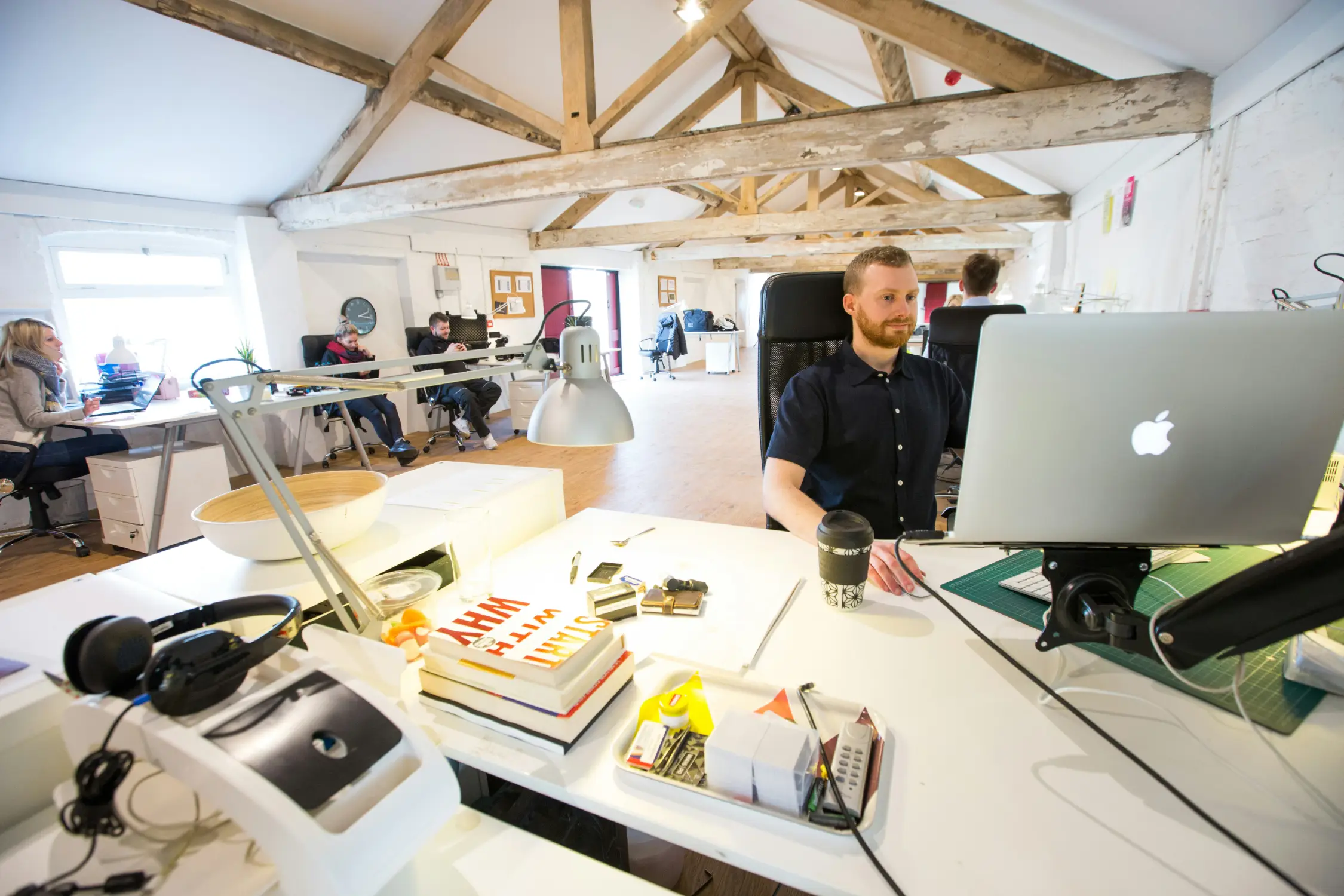 Man sitting at a desk and working on computer